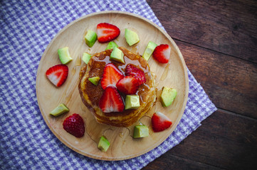 pancake strawberry avocado fruit and honey syrup sweet dessert on wood table pan cake dessert homemade