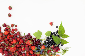 Strawberry, currant, gooseberry, cherry, raspberry on white background with leaves
