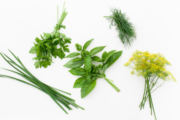 Bunch of Basil, parsley, dill and jusai on white