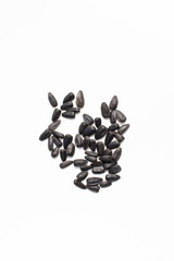 Sunflower seeds on a white background.