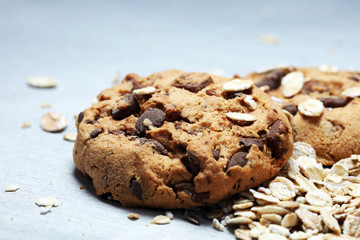 Chocolate cookies on rustic table. Chocolate chip cookies and cookies with oat flakes or oatmeal.
