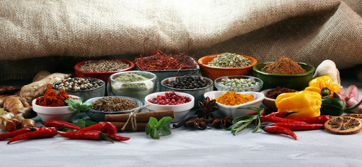 Fototapeta na wymiar Spices and herbs on table. Food and cuisine ingredients.