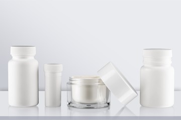 Cosmetic containers isolated on background