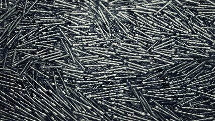 Chrome screws pattern, industrial background, texture.
