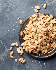 Dried pomelo slices on gray concrete background. Top view of candied fruits