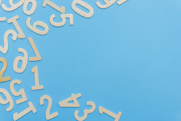The numbers are cluttered on blue paper