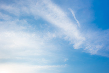 Fototapeta na wymiar Blue sky with white clouds as a background