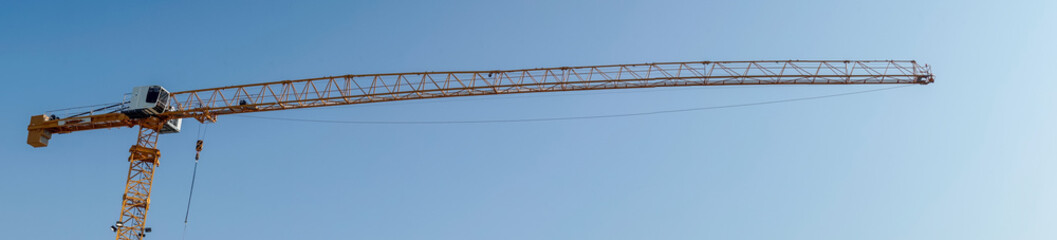 Construction Crane and Clear Blue Sky