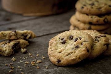 Chocolate cookies on natural wooden table.