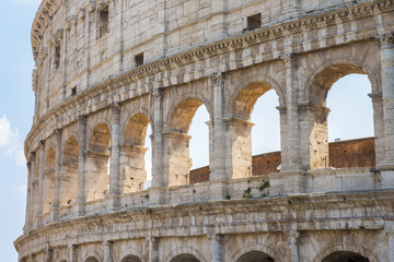 Obraz premium Detail of the Colosseum, known as Amphitheatrum Flavium, symbol of the city of Rome, of Italy and one of the seven wonders of the world. In ancient times it was used for gladiatorial shows.