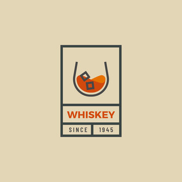 Vintage hipster logo of whiskey glass. Whiskey glass logo design. Vector outline logo of whiskey glass. Beverage design template for restaurants, bars, pubs and companies