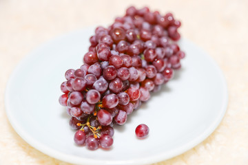 Ripe red grape. isolated on white. With clipping path. Full depth of field.