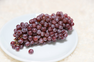 Ripe red grape. isolated on white. With clipping path. Full depth of field.