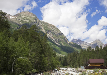Fototapeta na wymiar Pastoral view on mountains in valley near Elbrus