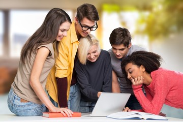 Group of Students with computer at lesson