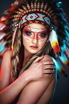 Portrait Of Feminine Indian Woman With Feather Hat