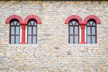 Fototapeta na wymiar windows on the wall of Orthodox church 