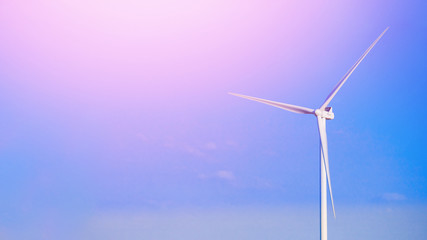 Wind turbines generating electricity. Concept alternative energy. Blue sky