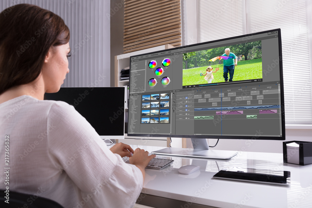 Poster Editor Editing Video On Computer