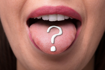 Woman's Tongue With Question Mark Sign
