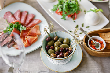 Different meals for the guests on Banquet table. delicious dishes on the table in the restaurant. serving table for birthday or wedding.