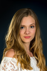 Teenage Girl Posing with Dark Background