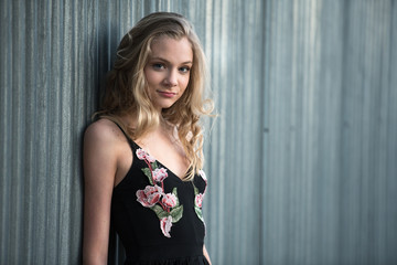Blond Teen Girl Wearing Black Maxi Dress