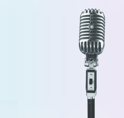 Fototapeta premium Retro style microphone on background