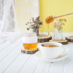 Cup of hot tea with sacking