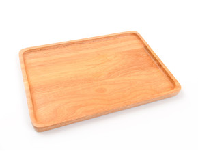 Brown wooden cutting board on white background