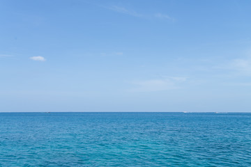 Naklejka na ściany i meble Calm Sea Ocean And Blue Sky Background