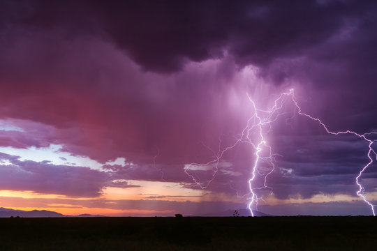 Lightning and thunderstorm at sunset