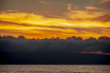 yellow sunset over island