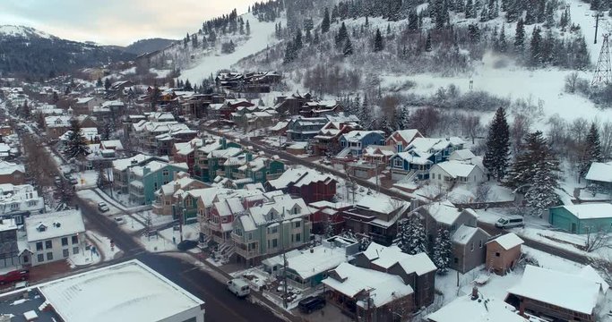 Aerial Drone Shot Flying Backwards Over Park City In Utah During A Winter Day At Sundance Film Festival