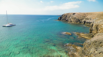 Yacht close to Lanzarote island coast.