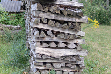 Stacked firewood in the garden 