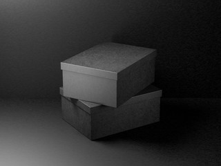 Two Black shoe or dress boxes packaging Mockup in dark studio