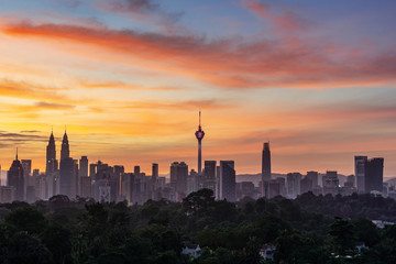 Fototapeta na wymiar Majestic sunrise over downtown Kuala Lumpur, Malaysia