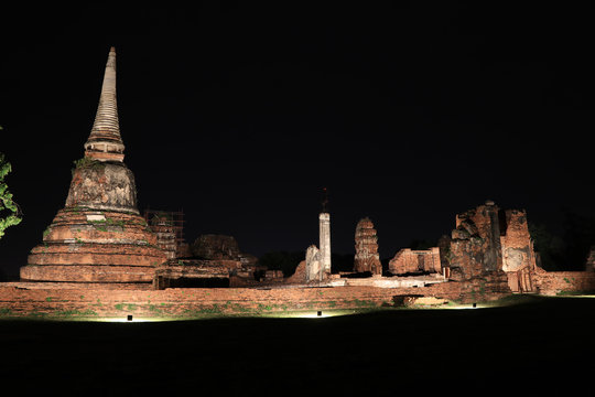 Night shot of incomplete small stupa in the ruins of ancient remains at Wat Mahathat temple, it built in 1374 AD in the Ayutthaya period.