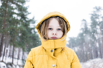 Portrait of a female child in snow conditions