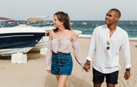 Interracial couple beach in Girona