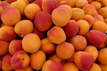 Peaches. A peach is a soft, juicy and fleshy fruit. Macro photography.