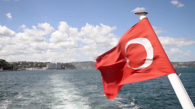Turkish Flag Waving, Boat Passing Through Bosphorus, Istanbul, Turkey