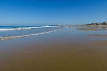 Barrosa beach in Sancti Petri, Spain, at low tide
