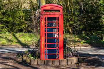 A derelict telephone booth, seen near Flixton, Suffolk, England, UK