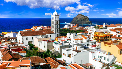 Garachico Tenerife 8k high resolution panorama of colorful town in Spain. Scenic Canary Islands coastal architecture with church tower and blue ocean view © Freesurf