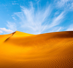 Fototapeta na wymiar Amazing view of sand dunes in the Sahara Desert. Location: Sahara Desert, Merzouga, Morocco. Artistic picture. Beauty world.