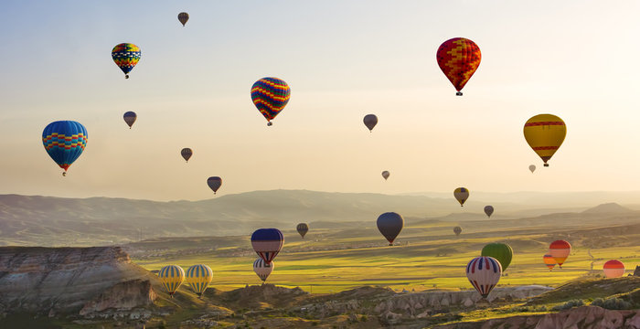 The great tourist attraction of Cappadocia - balloon flight. Cappadocia is known around the world as one of the best places to fly with hot air balloons. Goreme, Cappadocia, Turkey. Panorama