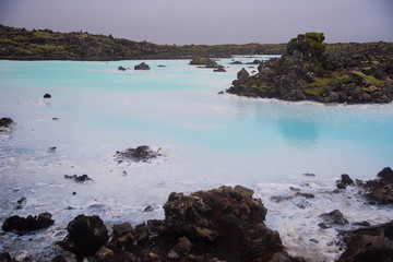 Fototapeta na wymiar The Blue Lagoon geothermal spa and lava rocks in Iceland.