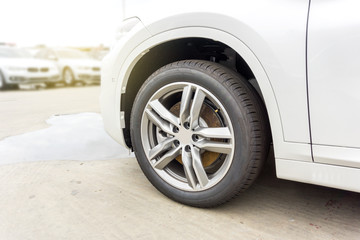 Car Brake discs are rusty after drive when rainy will, Corrosion on metal surfaces.
